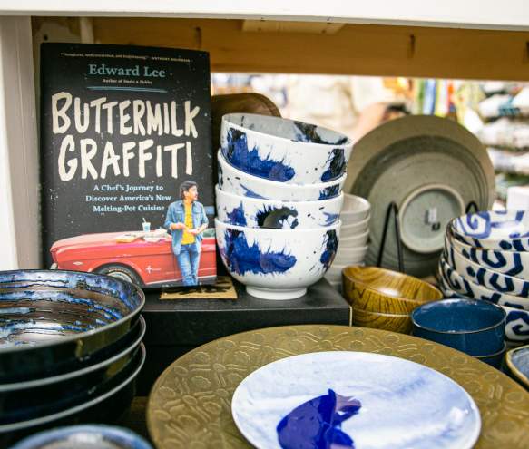 Display of dishes and cookbooks at Goods for Cooks