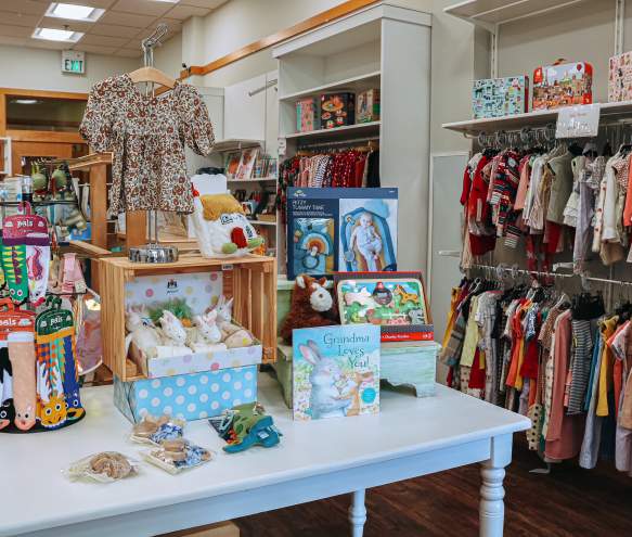 Displays of children's items for sale at O'Child Children's Boutique