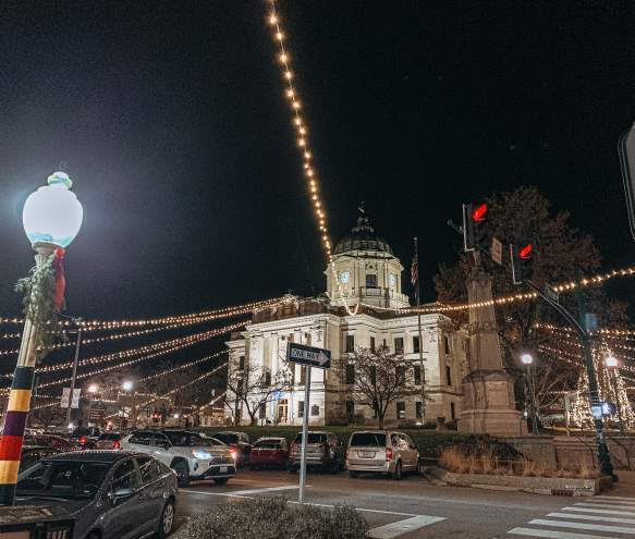 The Square lit up with twinkle lights and holiday decor