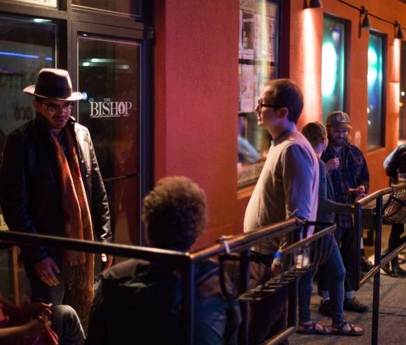People standing & talking outside of The Bishop Bar
