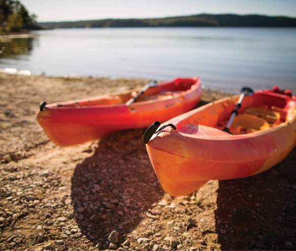 Kayaks on the shore of Monroe Lake