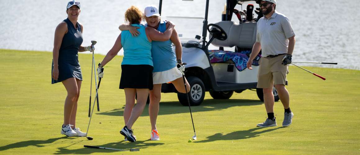 Indiana Sports Corp - Golfers Celebrate