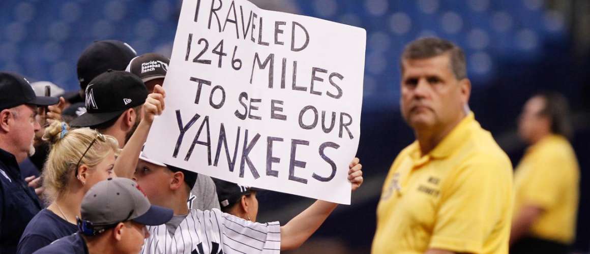 Yankees Fans Holding Sign