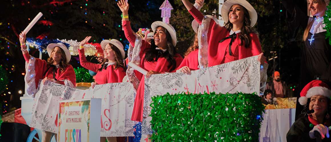 Ford Holiday River Parade - People waving with wands