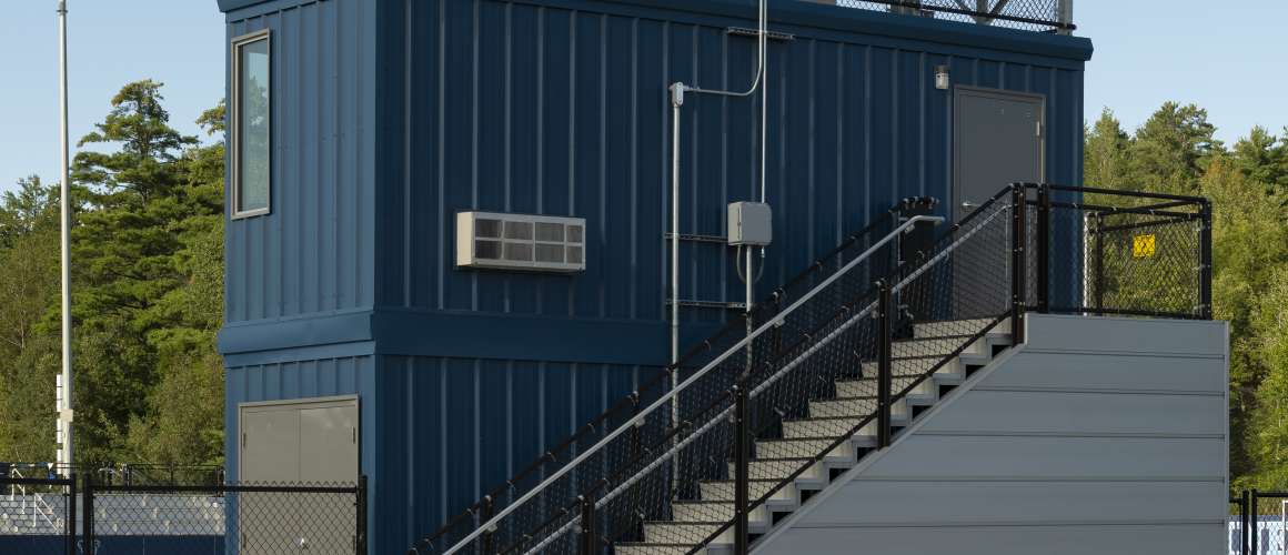 Stacked Pressbox over storage room