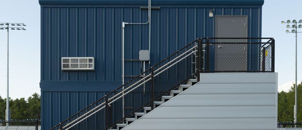 Stacked Pressbox over storage room