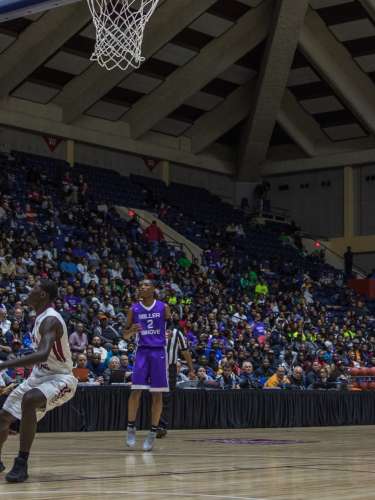 Spectators enjoy a basketball game in Macon, GA.