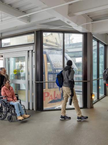 Guest in wheelchair enjoys a ride on the Palm Springs Aerial Tramway