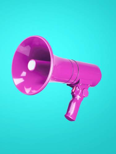 Beautiful colored pink megaphone on a cold blue background. A combination of complimentary colors. Advertising and message concept