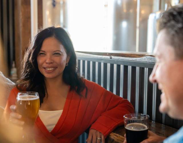 PetSkull Brewing woman drinking beer