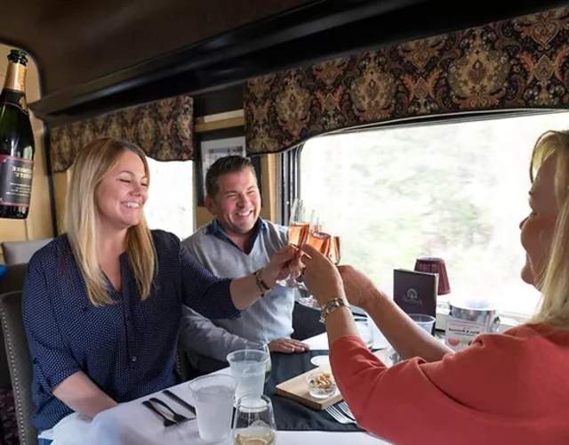 people in train cheers