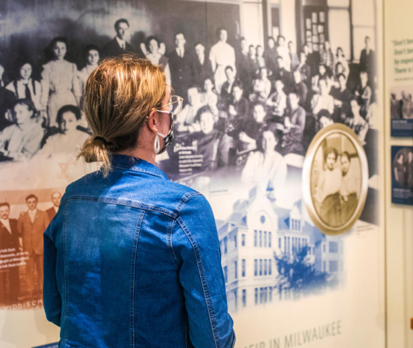 woman looking at an exhibit