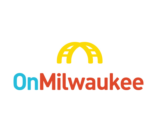 A golden arch symbolizing the Hoan Bridge in Milwaukee above text that reads "OnMilwaukee" with the "On" being in blue and the "Milwaukee" being in red, against a white background.