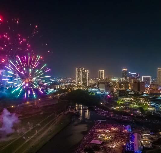 Fireworks light up the night sky over Fort Worth during Fourth of July festivities.