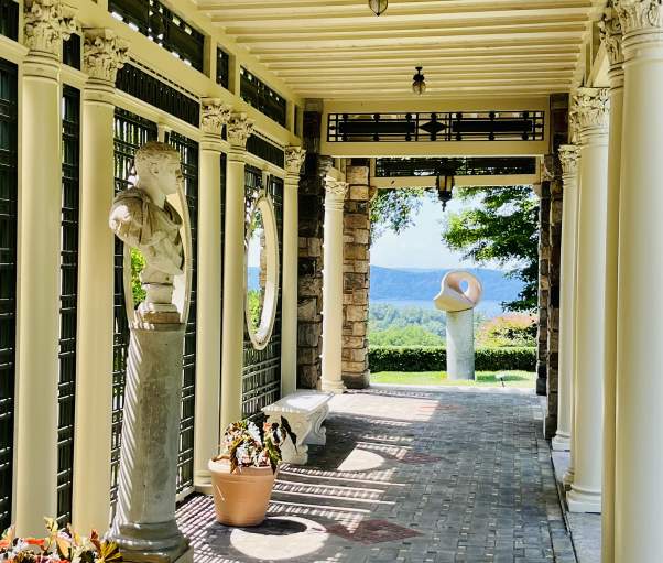 The patio at Kykuit with a view of the Hudson River in the distance.