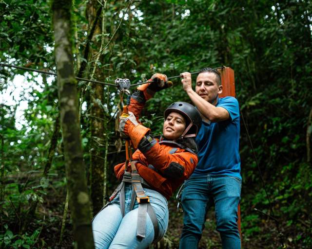 Woman doing zip line at Volcan, Chiriqui