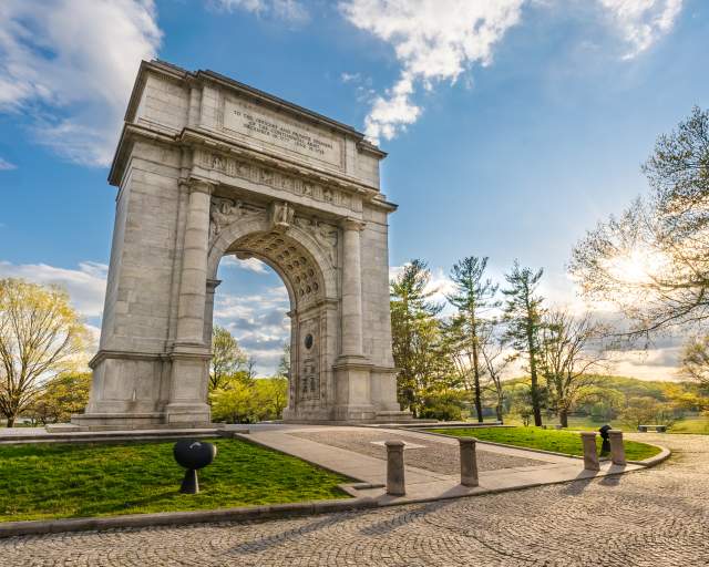 The iconic arch at Valley Forge National Historical Park in King of Prussia on a sunny day.