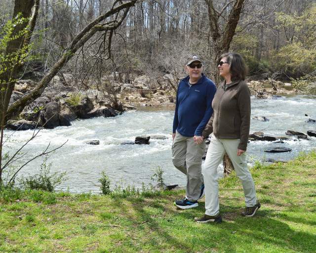 Couple hiking along the Deep River State Trail