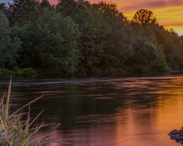 A river with a sunset in the background in the Lehigh Valley