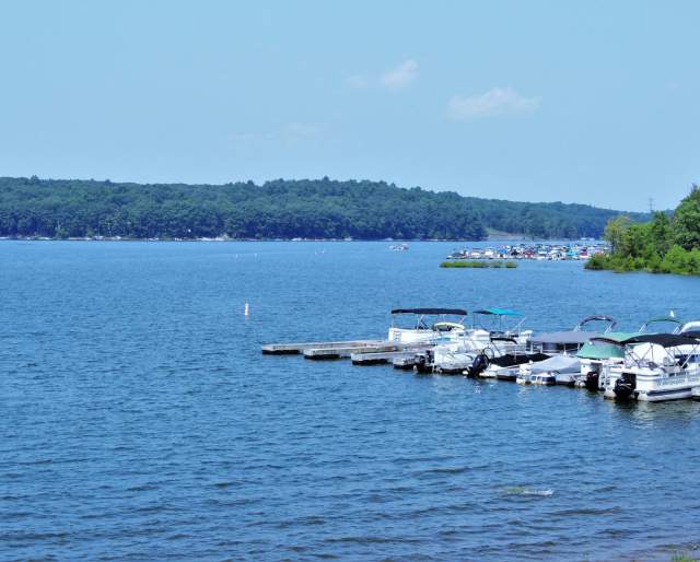 A dock of empty boats sitting on Lake Nockamixon in the Pocono Mountains