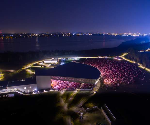Lakeview Amphitheater at Night with Crowd Lit Up