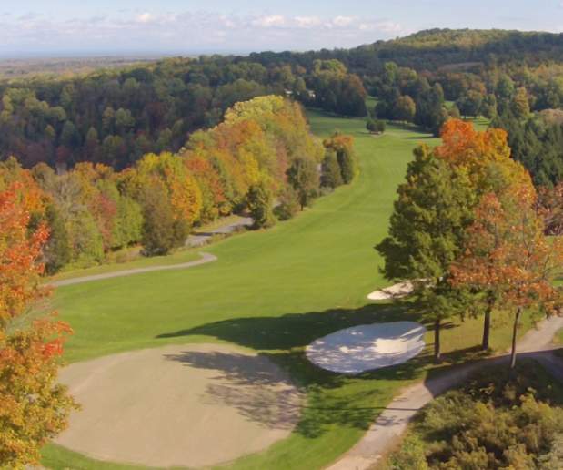Bird's Eye View of Green Lakes Golf Course Surrounded by Colorful Fall Trees
