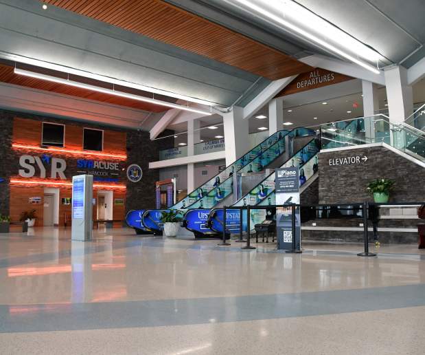 SYR Airport Grand Hall with elevators and escalators
