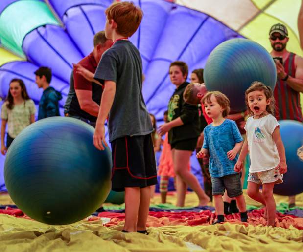 Kids inside a hot air balloon at Jamesville Balloonfest