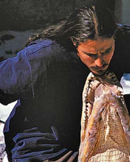 Watch professionals wrestle with alligators.