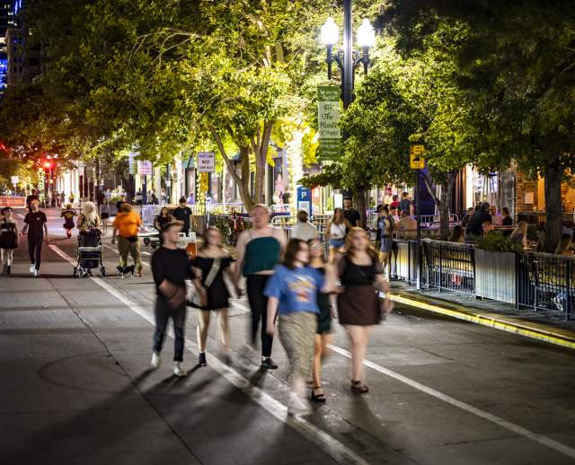 A group walking down Main Street during 2022’s Open Streets.