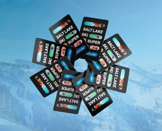 8 super pass cards in a circle on top of a faded blue background of mountains with snow