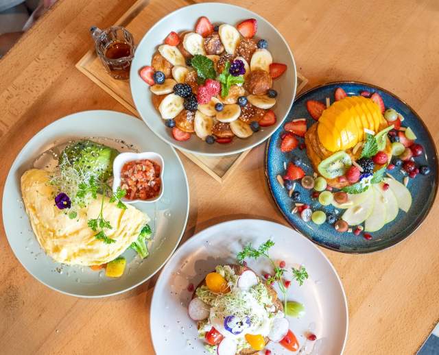 Image of four dishes at early Owl Cafe in Salt lake.