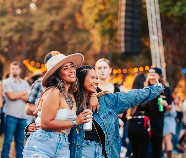 Two girls taking a selfie at GoldenSky Country Music Festival