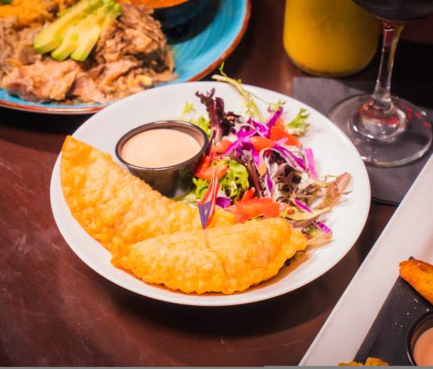A spread of dishes at Lola's Lounge, first Puerto Rican restaurant in Sacramento