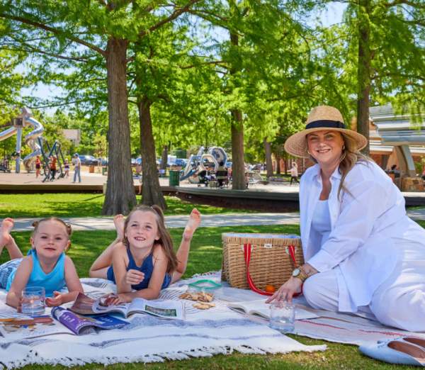 a family enjoying a picnic in the park