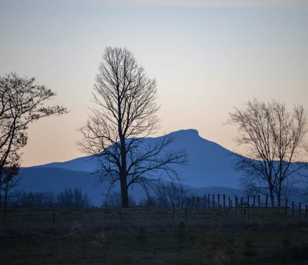 The sun rises near Camels Hump, Vermont