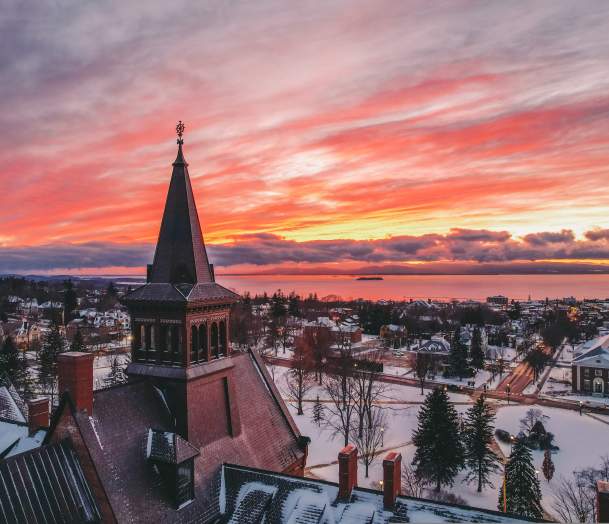 Old Mill at UVM, winter sunset over Lake Champlain