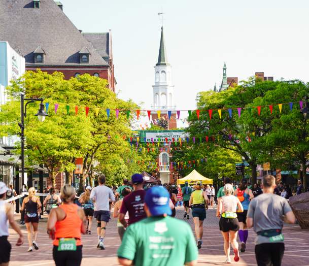 Photo of Church Street full of tourists and people running the Burlington City Marathon