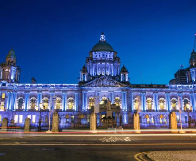 Belfast city hall lit up at night