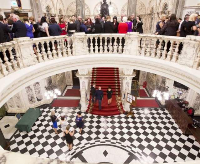People in city hall rotunda.