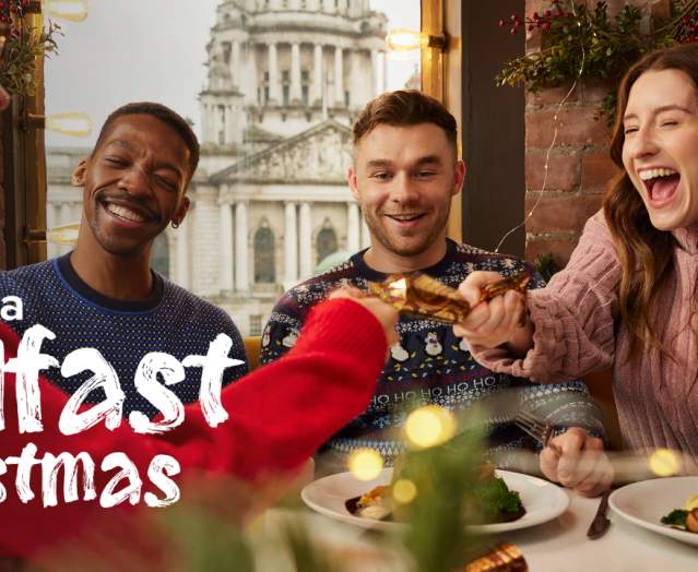 Group enjoying a Christmas dinner at Parisien