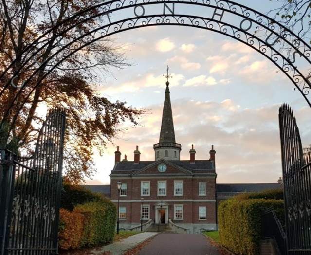 View of the exterior of Clifton House - The Belfast Poor House through the gate