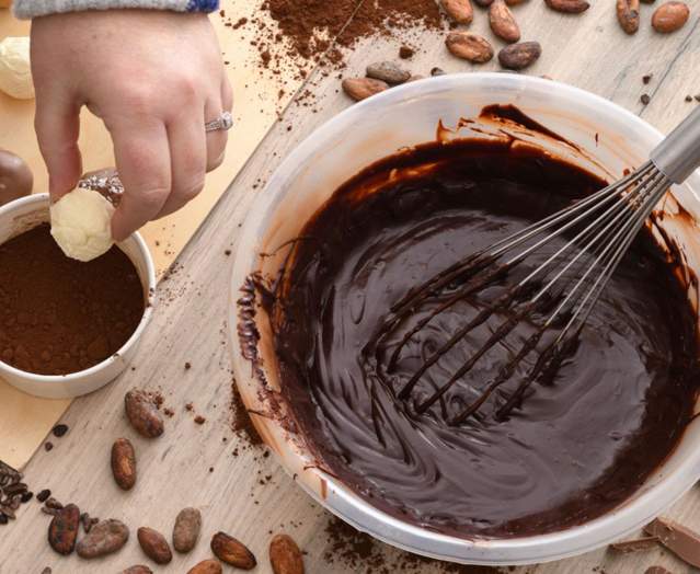 A bowl of melted chocolate and truffles at The Chocolate Manor