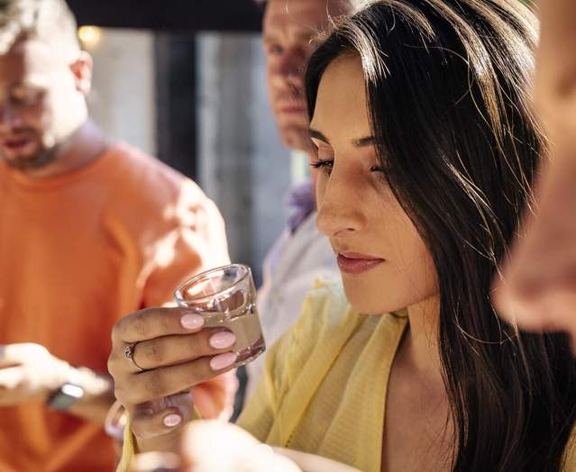 Group taste a cacao shot as part of the Master Craft Chocolate Experience