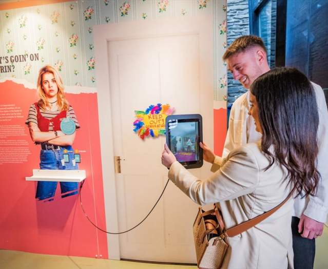 Guests interact with exhibitions at the Derry Girls Exhibition
