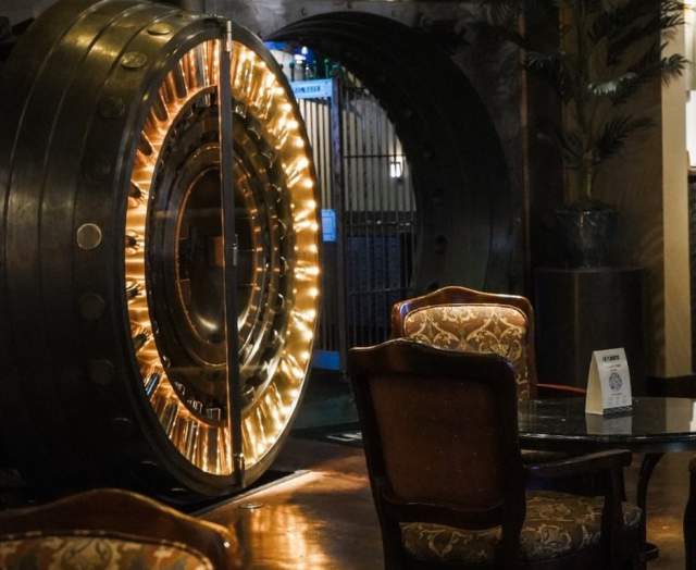 Lighted vault door, table and chairs
