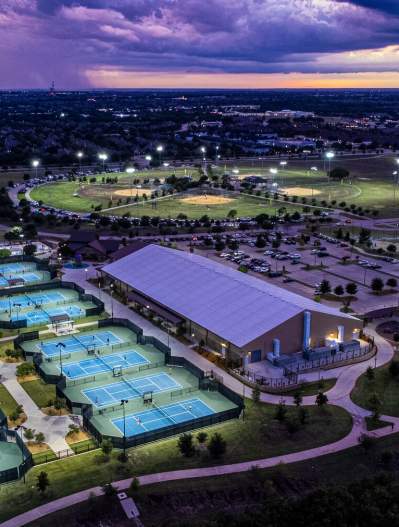 Gabe Nesbitt Community Park - at night - tennis courts, baseball and soccer fields and skate park