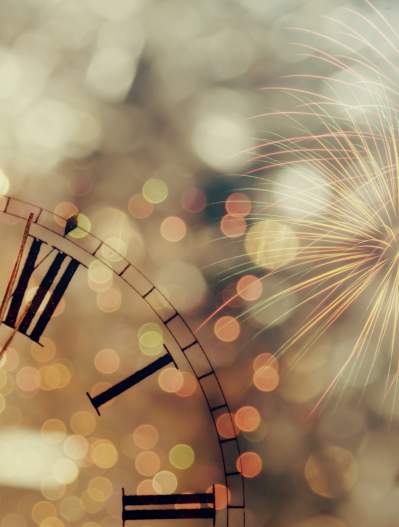 New Year's eve photo with clock and fireworks