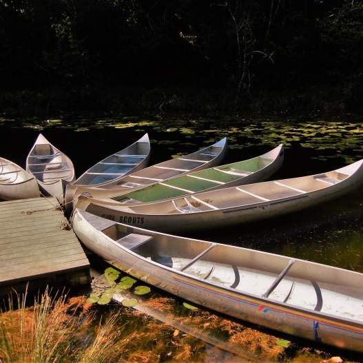 Canoes at Lake Cleawox on the Oregon Coast by Bonnie Melville