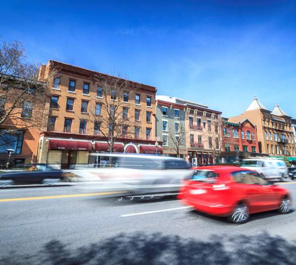 Cars passing on a busy street in Saratoga